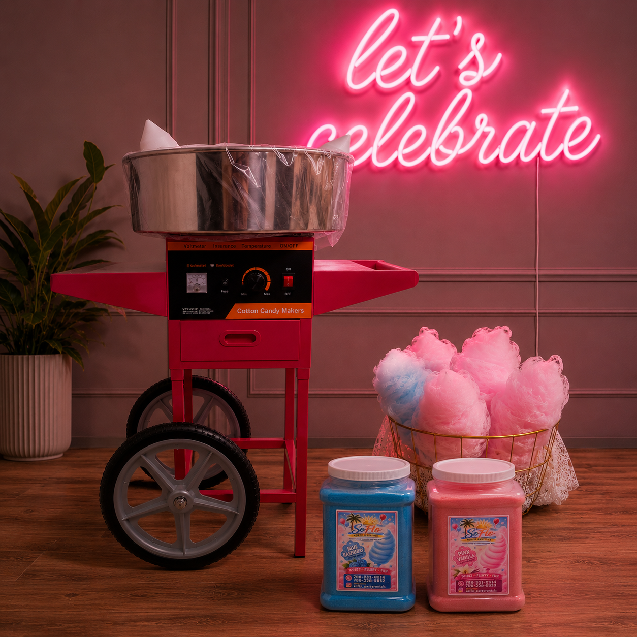 Commercial cotton candy machine spinning fresh pink cotton candy